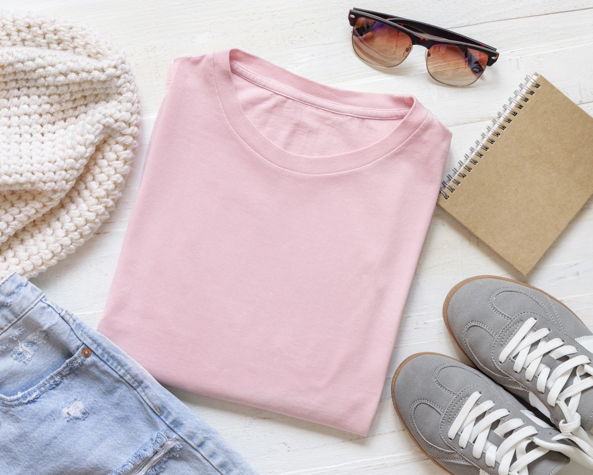 Folded t-shirt flat lay used as a testimonial avatar image